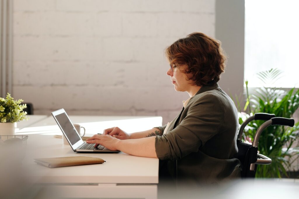 woman looking at laptop