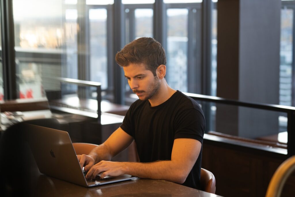 man using laptop